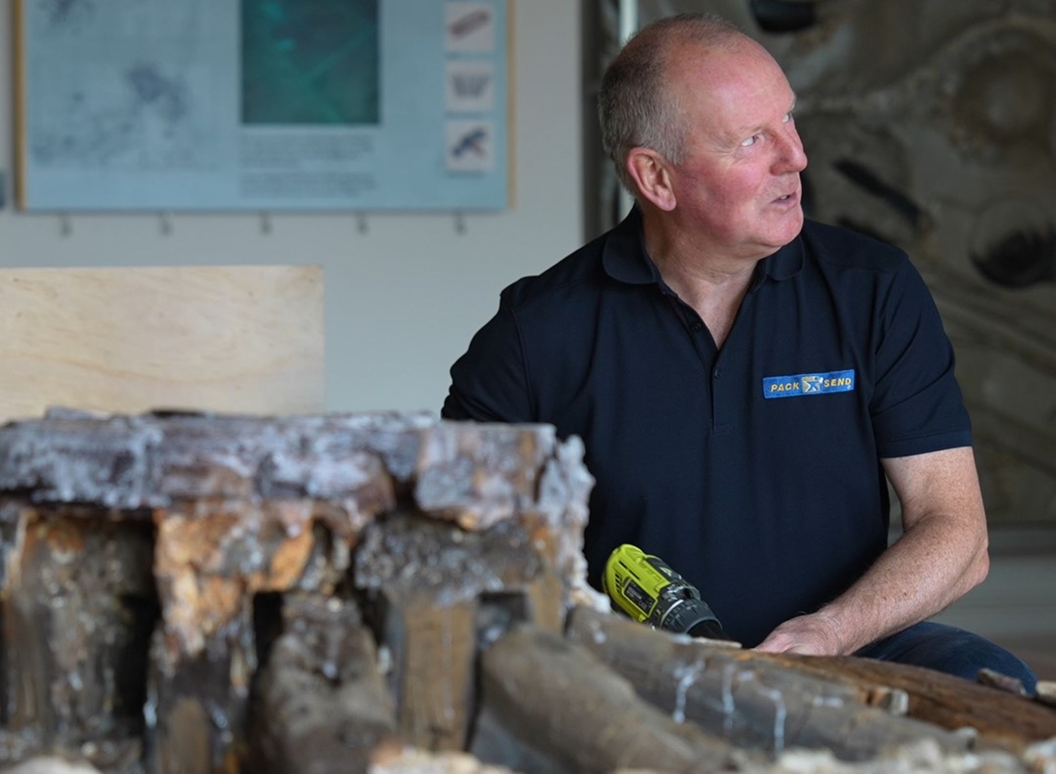 Artefacts being carefully lowered from Tower Museum